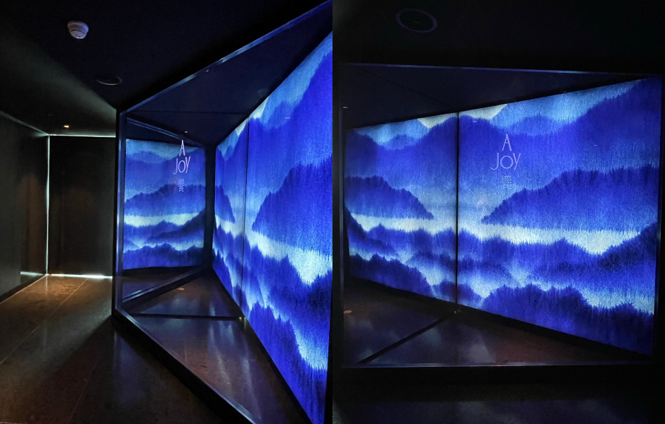 饗 A JoyFotoJet (9)「進山」由天染工坊與非常口制研所打造，在幽暗的梯廳形成強烈的光影對比