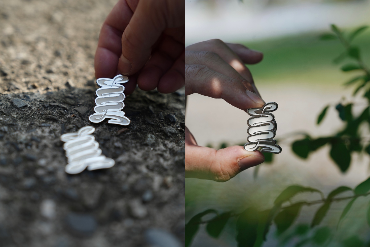 美字徽章（圖片提供：辵辵計画）