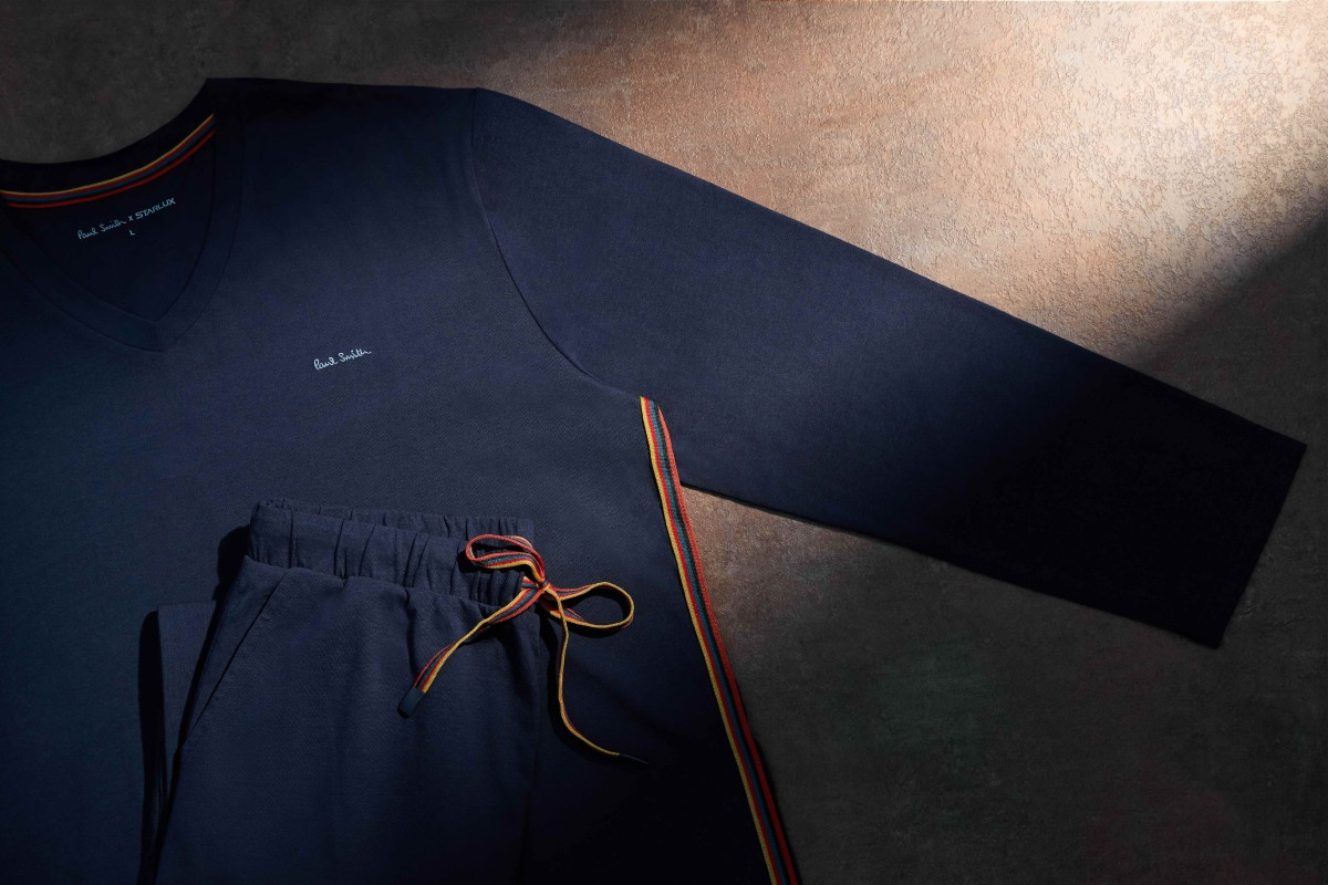 上衣腰身裝飾、褲頭及外層布套抽繩點綴品牌一眼即識的彩色線條元素。（圖片提供：星宇航空）