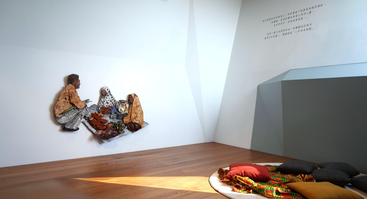 其作品《在Guelae的市場》。（圖片提供：毓繡美術館）