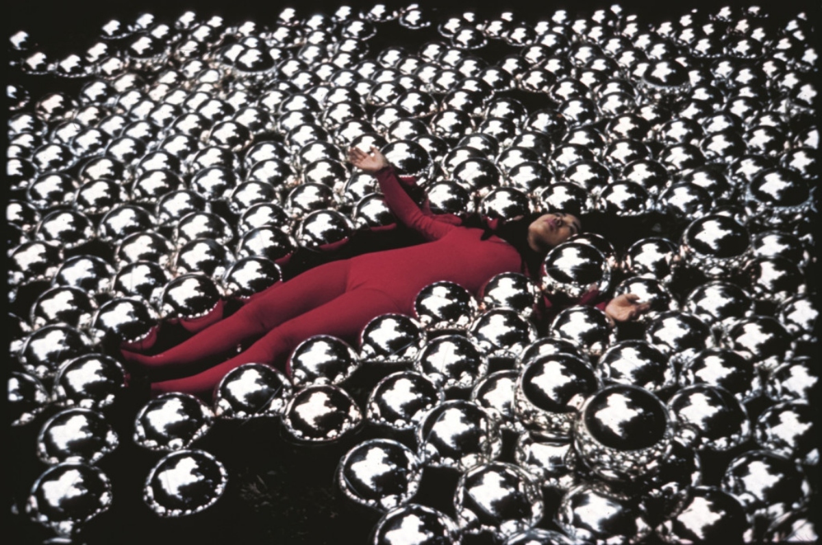 Yayoi Kusama amid her installation 'Narcissus Garden' at the 33rd Venice Biennale, 1966. Courtesy of Ota Fine Arts and David Zwirner. © YAYOI KUSAMA
