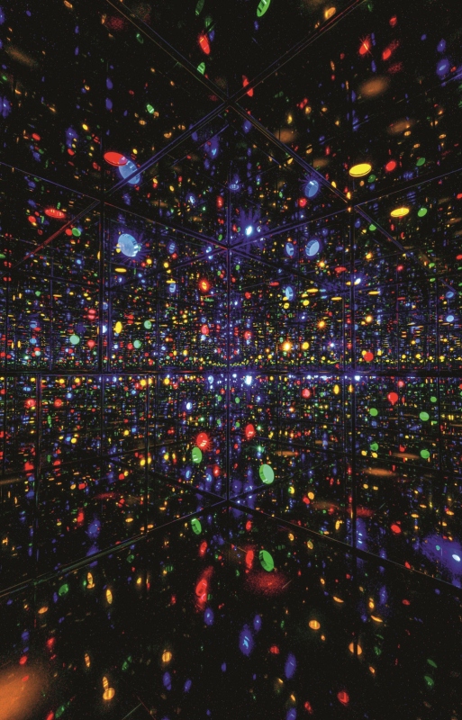 Yayoi Kusama, Infinity Mirrored Room – 'Illusion Inside the Heart', 2025. Mirror-polished stainless steel with glass mirrors and colored acrylic, 300 × 300 × 300 cm, inside view. Collection of the art