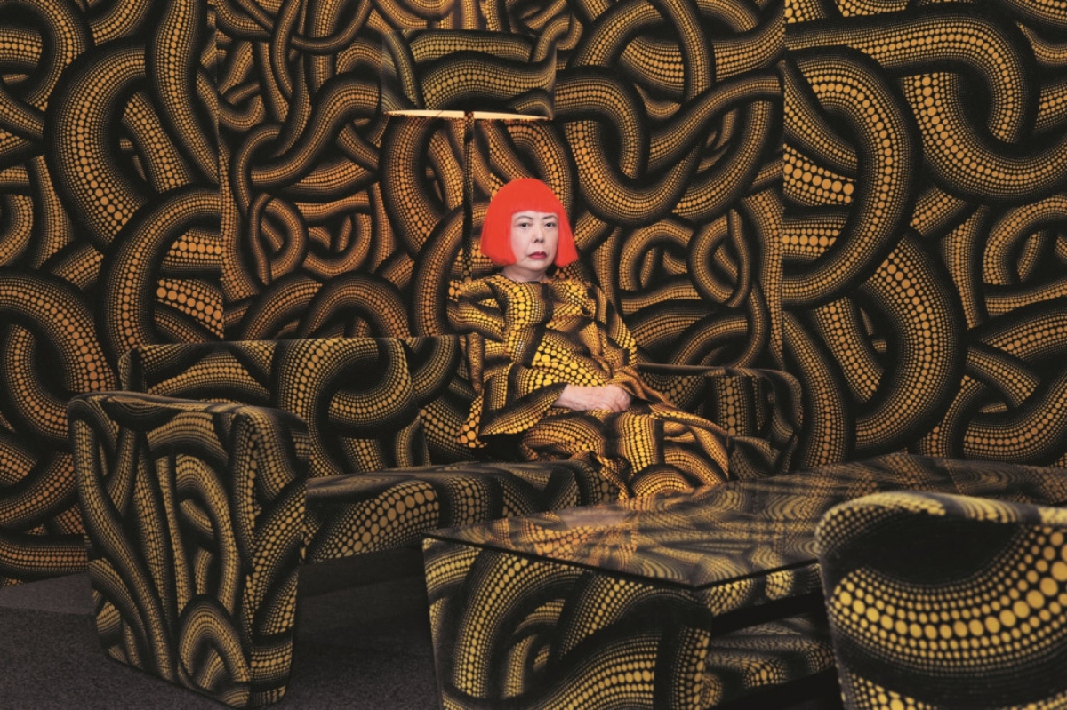 Yayoi Kusama with 'Yellow Tree / Living Room' at the Aichi Triennale, 2010 © YAYOI KUSAMA. Courtesy of Ota Fine Arts and David Zwirner